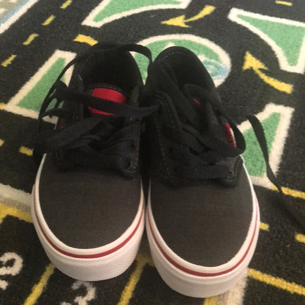 New. Never worn black and red vans sneakers.